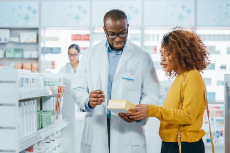 A Pharmacist talking with a customer