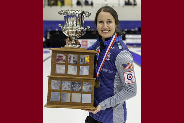 Tabitha Peterson holding a trophy