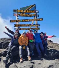 Ryan Galloway, Soyang Ha, Shu Ying Ng, Brittnay Karns, Carl Sherman, and Katie Oja, at Mt. Kilimanjaro summit in Tanzania