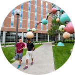 Students walking near campus building