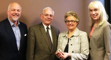Lucy Johnson with her master’s committee members Jon Schommer, Bruce Benson and Ruth Lindquist