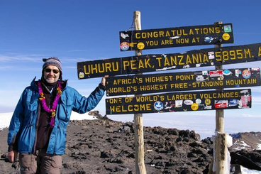 Bill Diers standing on top of Uhuru Peak