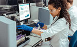Woman working in medical science lab